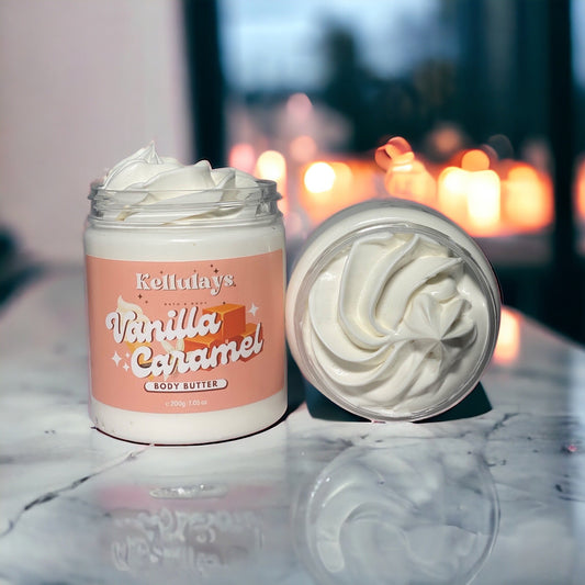 Two jars of white swirl vanilla caramel whipped body butter by Kellulays, made with nourishing shea butter lotion and rich cocoa butter lotion for ultimate skin hydration.