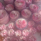 Kellulays Rose Quartz Whipped Body Butter in a jar, featuring beautiful light pink and dark pink swirls. This luxurious body butter is a handmade skincare treat, perfect for nourishing and hydrating your skin.