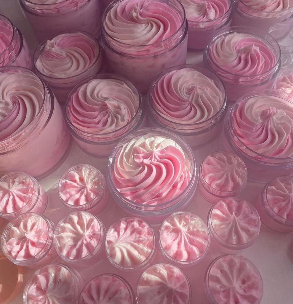 Kellulays Rose Quartz Whipped Body Butter in a jar, featuring beautiful light pink and dark pink swirls. This luxurious body butter is a handmade skincare treat, perfect for nourishing and hydrating your skin.