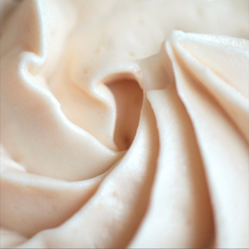 Jars of tropical coconut body butter in 100g and 200g sizes, featuring a rich, creamy texture for deep skin hydration and nourishment.