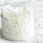 Vanilla Sandalwood Whipped Body Butter in a jar, showcasing its creamy texture and luxurious formulation. Enriched with nourishing ingredients for deep hydration and a soothing vanilla and sandalwood scent.